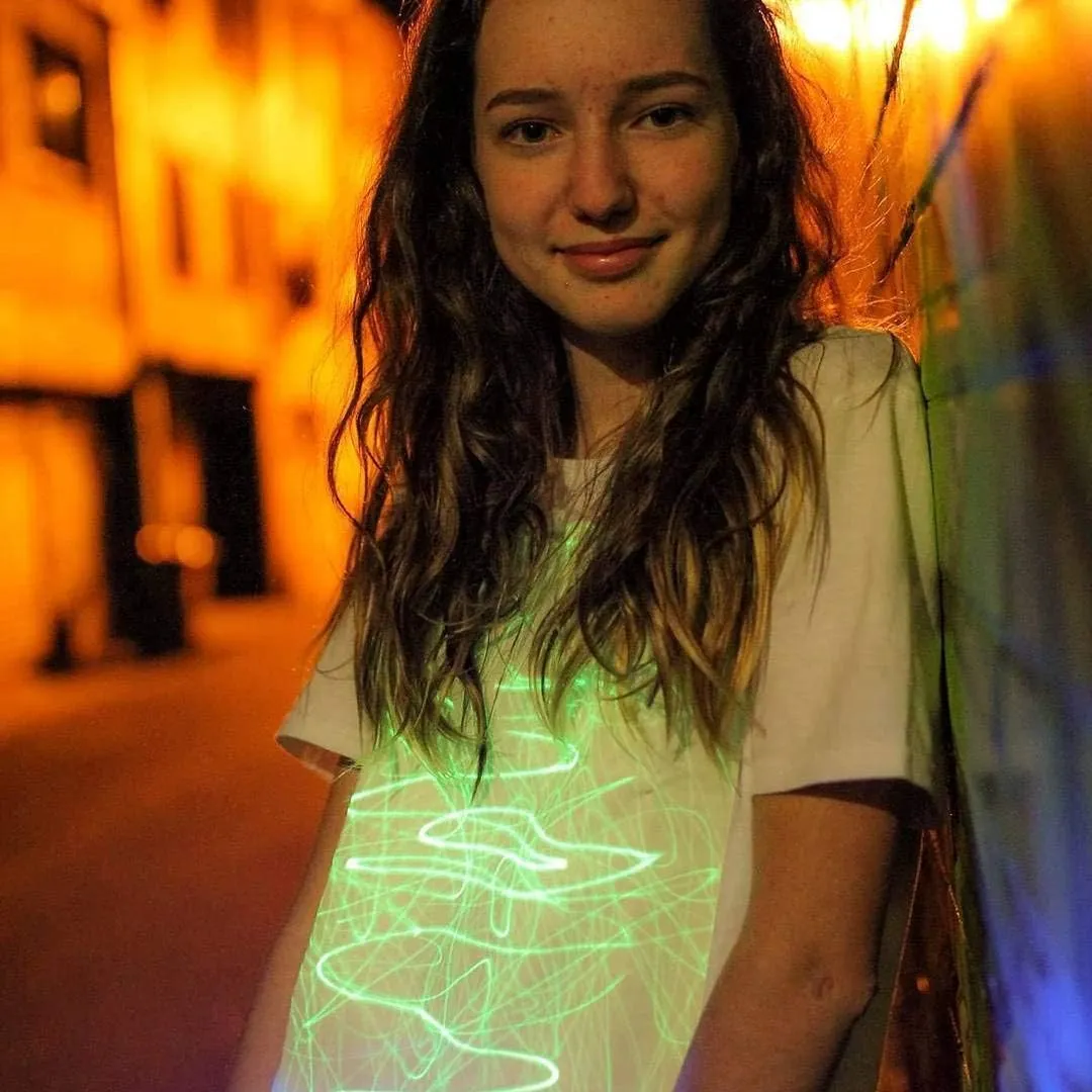 Illuminated Apparel Original Interactive Glow in The Dark T-Shirt - Fun for Birthday Parties & Festivals