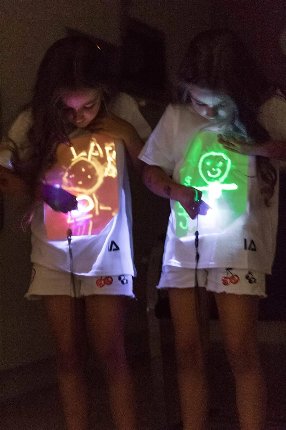 Illuminated Apparel Original Interactive Glow in The Dark T-Shirt - Fun for Birthday Parties & Festivals